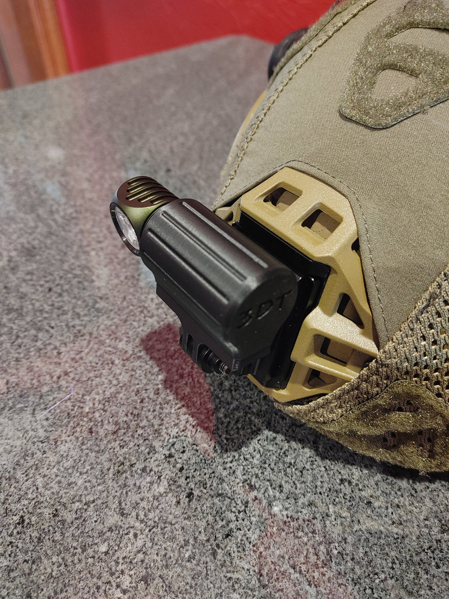 Tactical Helmet Flashlight Mount designed to be Compatible with the Olight Perun 2 Mini Headlamp