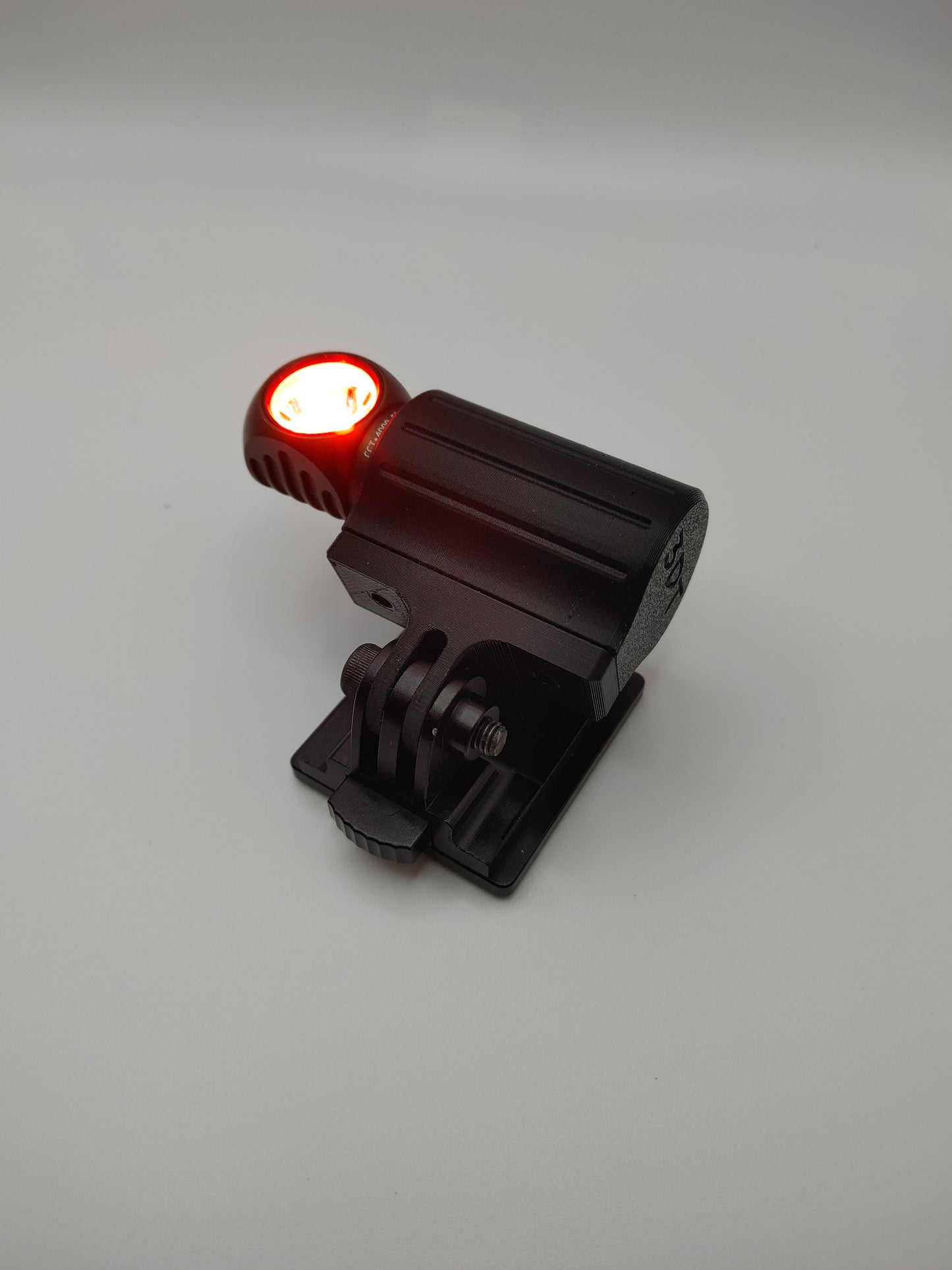 Tactical Helmet Flashlight Mount designed to be Compatible with the Olight Perun 2 Mini Headlamp